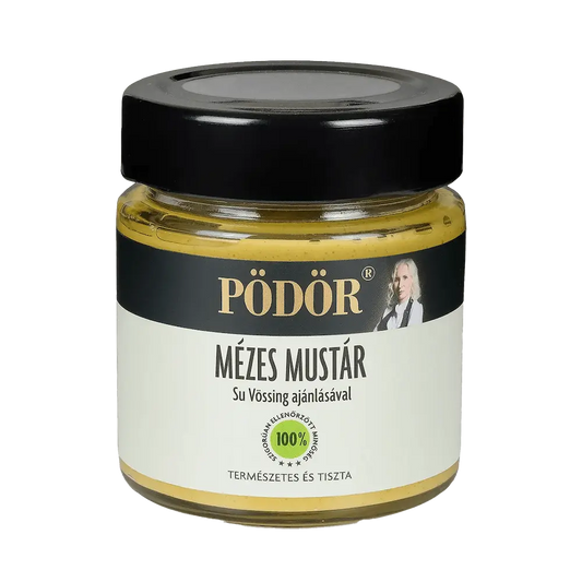 Pödör mézes-mustár látható a képen, az üvegen keresztül látszik a mustár, amely gyönyőrű színú. A címke fehér és fekete színű, a "Mézes mustár" felirat fekete színű. 